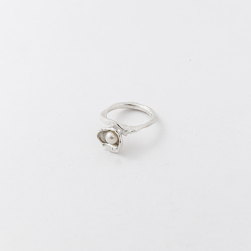 The Pearl in the Shell Ring